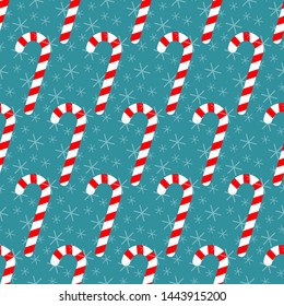 Seamless pattern with candy canes and snowflakes, Christmas vector illustration