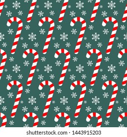 Seamless pattern with candy canes and snowflakes, Christmas vector illustration
