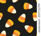 Seamless pattern with candy corn and black background