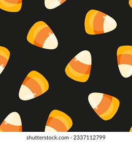 Seamless pattern with candy corn and black background