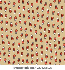 Seamless pattern candy corn. Halloween candy hand drawn doodle background. Festive print trick or treat