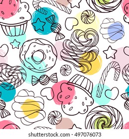 Seamless pattern with candy, donuts and lollipops on a polka dot background.