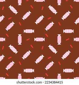 seamless pattern with candy and sprinkles on brown background. Vector illustration.