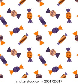 Seamless pattern with candy wrappers. Orange-purple colors. A backdrop for Halloween cards. Color vector illustration in a flat style. The elements are isolated on a white background