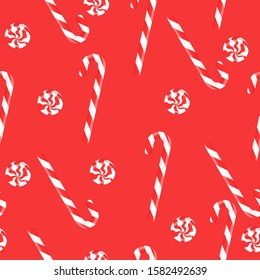 Seamless pattern with cane candies. Vector graphics.