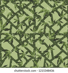 Seamless pattern. Cannabis leaves on the background of the lattice. Editable.