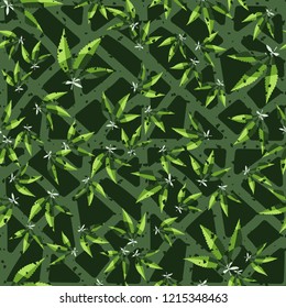 Seamless pattern. Cannabis leaves on the background of the lattice. Editable.