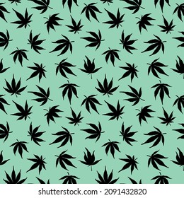 Patrón sin foco de hojas de cannabis en un fondo verde. El cáñamo negro sale sobre un fondo verde. Ilustración botánica.