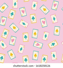 Seamless pattern of a card game on a soft pink background.