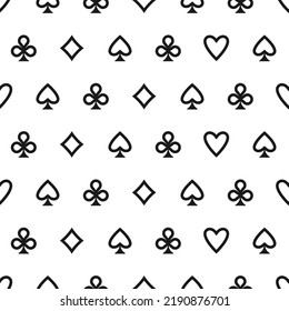 Seamless pattern with card suits - hearts, clubs, spades and diamonds. Casino gambling, poker background. Alice in wonderland ornament.