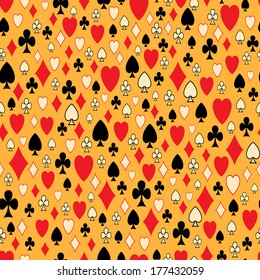 Seamless pattern with card suits on a yellow background.Vector.