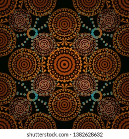 Seamless pattern for cards, prints, textile, fabric, books covers or wrapping paper. Flower mandala vector colorful background foin orange, magenta and black colors.