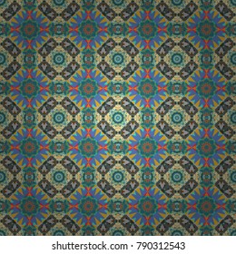 Seamless pattern for cards, prints, textile, fabric, books covers or wrapping paper. Flower mandala vector colorful background foin blue, brown and orange colors.
