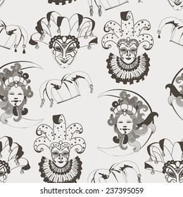 Seamless pattern with carnival venetian traditional masks on gray background. Monochrome vector illustration