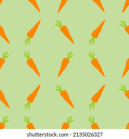 Seamless pattern with carrots. Carrots on a green background. Vector pattern. Wrapping paper pattern. Patterns for decoration. Hand drawn vector.
