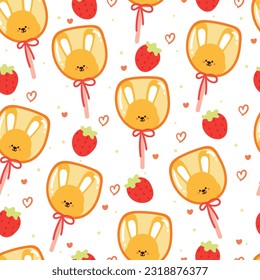 seamless pattern cartoon bunny lollipop with strawberry. cute animal dessert pattern for kids, gift wrap paper