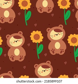 seamless pattern cartoon cat with bear costume and sunflower. cute wallpaper for kids, textile, gift wrap paper