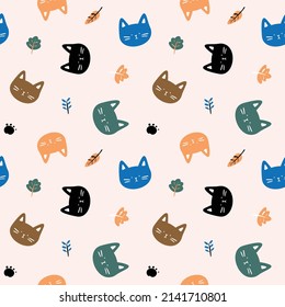 Patrón sin inconvenientes con caricatura Cara de gato y diseño de hojas en fondo rosa claro