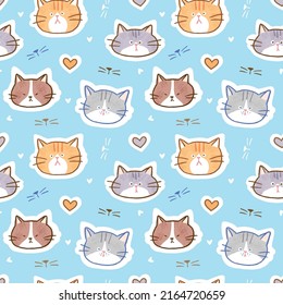 Patrón sin problemas con caricatura Cara de gato y diseño cardíaco en fondo azul claro