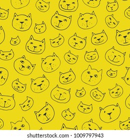 Seamless pattern with cartoon cat faces and yellow background. Modern design for fabric and paper, web page background, surface textures.