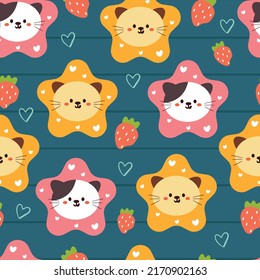 seamless pattern cartoon cat and strawberry in blue background. cute animal drawing