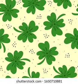 Seamless pattern with cartoon clover, decor elements on a neutral background. festive colorful vector for St. Patrick's Day. Hand drawing, flat style. Design for fabric, textile, print, wrapper.