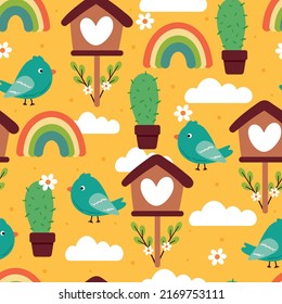 nahtlose Muster Cartoon süße Vogel mit Pflanzen, Vogelhaus, Regenbogen, heller Himmel auf gelbem Hintergrund. süße Tapete für Textilien, Geschenkpapier