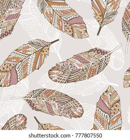 Seamless pattern with cartoon feathers.