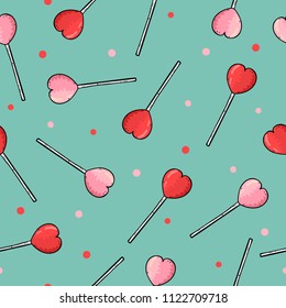 Seamless pattern with cartoon heart shaped lollipops.