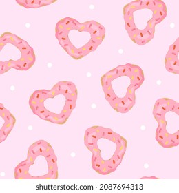 Seamless pattern with cartoon heart shaped donut. Background for wrapping paper, textile, posters, cards. Happy Valentine's day.