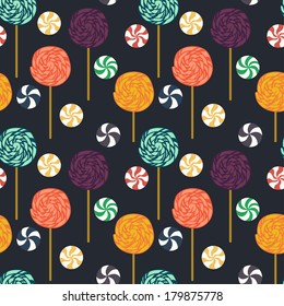 Seamless pattern with cartoon lollipops and candies. Flat style background.