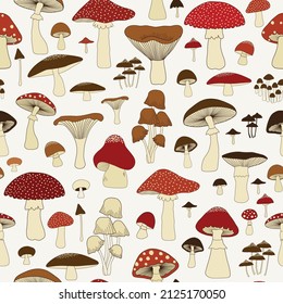 Seamless pattern with cartoon mushrooms  on white background