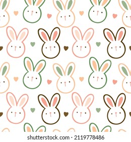 Patrón sin problemas con cara de conejo de dibujos animados y diseño cardíaco en fondo blanco