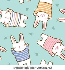 Seamless Pattern with Cartoon Rabbit and Heart Design on Pastel Green Background
