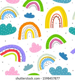Seamless pattern with cartoon rainbows, clouds, decor elements. Colorful vector illustration for kids. Hand drawing flat style. baby design for print, fabric, wrapper, textile