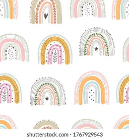 seamless pattern with cartoon rainbows. colorful vector for kids. hand drawing, flat style. baby design for fabric, print, textile, wrapper