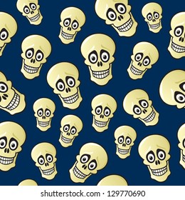 A seamless pattern of cartoon skulls with wide eyes and a dark blue background.
