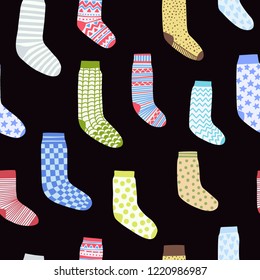 seamless pattern with cartoon socks on a black background