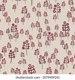 Seamless pattern with cartoon style hand drawn berries and branches. Red and tan pattern with colorful dots is cute, natural and has a Christmas, winter and autumn feel.