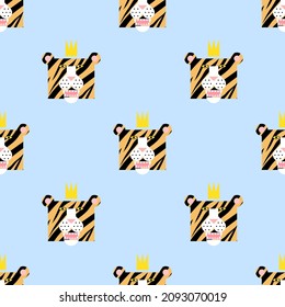 Seamless pattern with cartoon tiger head wearing a crown. Festive background or print.