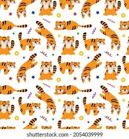 Seamless pattern with cartoon tigers. Cute tiger vector. A beautiful pattern is perfect for the design of children's textiles, exercise books, gift wrapping.