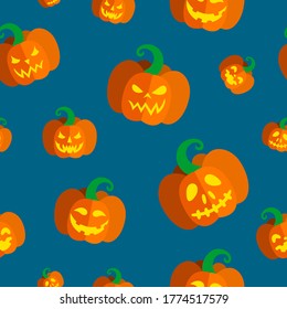 Seamless pattern with carved pumpkins for Halloween. Vector illustration with colorful pumpkins in blue background