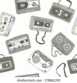 Seamless pattern of cassette tapes. Vector background.