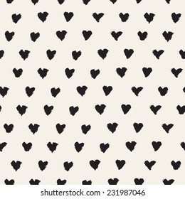 Seamless pattern. Casual polka dot texture. Stylish print with hand drawn hearts made with brush