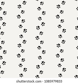 Seamless pattern of cat or dog footprint. Stylish vector print.