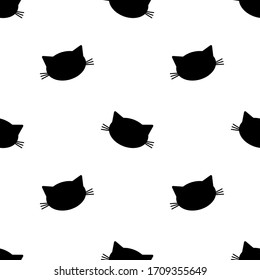 Seamless pattern with cat face silhouette. Black objects isolated on white background. Vector illustration.