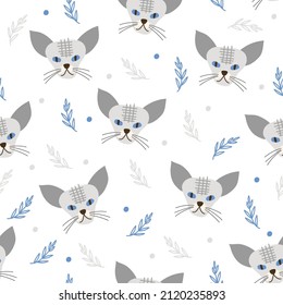 Seamless Pattern with cat faces. Vector illustration. 