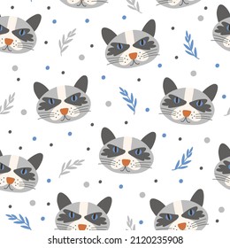 Seamless Pattern with cat faces. Vector illustration. 