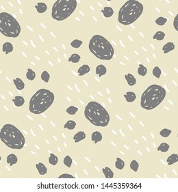 Seamless pattern of cat footprints. Cute hand-drawn pattern.