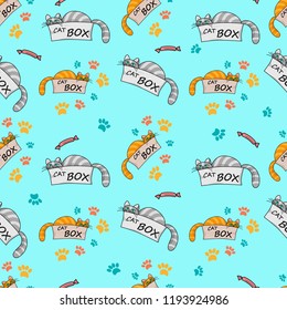 Seamless pattern.Red cat with green eyes peeking out of cardboard box. Striped pet with mustache.Cute  animal,paw on blue background.Vector illustration for children.Print for fabric,textile,wrapping.